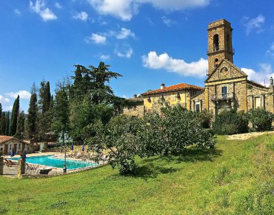 Antic Castle on private hill surrounded by old cypresses and vineyards